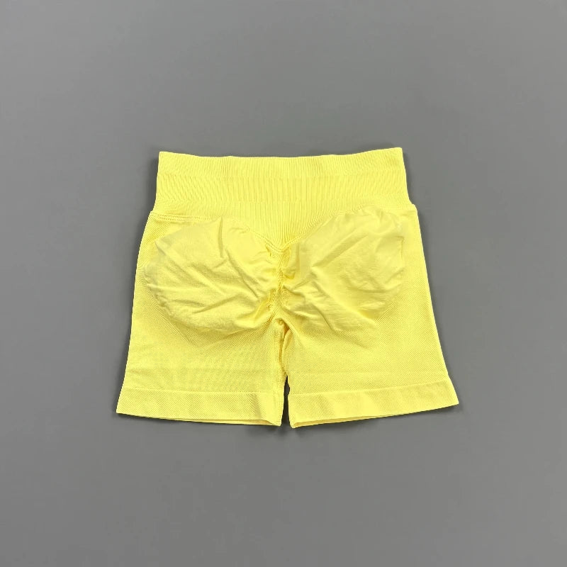 Pantalones cortos deportivos para mujer (tiro bajo, 4,5 pulgadas): ideales para fitness, ciclismo, running y yoga; diseño sin costuras y efecto "scrunch" para realzar los glúteos.