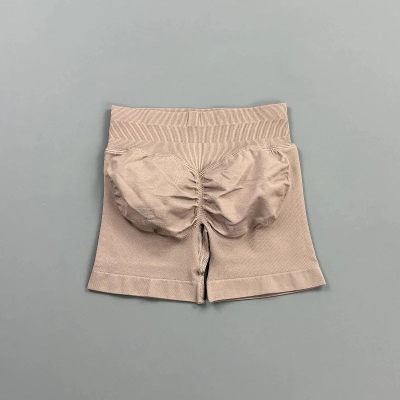 Pantalones cortos deportivos para mujer (tiro bajo, 4,5 pulgadas): ideales para fitness, ciclismo, running y yoga; diseño sin costuras y efecto "scrunch" para realzar los glúteos.