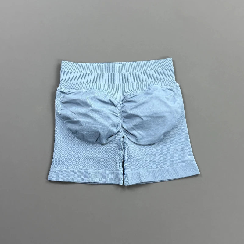Pantalones cortos deportivos para mujer (tiro bajo, 4,5 pulgadas): ideales para fitness, ciclismo, running y yoga; diseño sin costuras y efecto "scrunch" para realzar los glúteos.