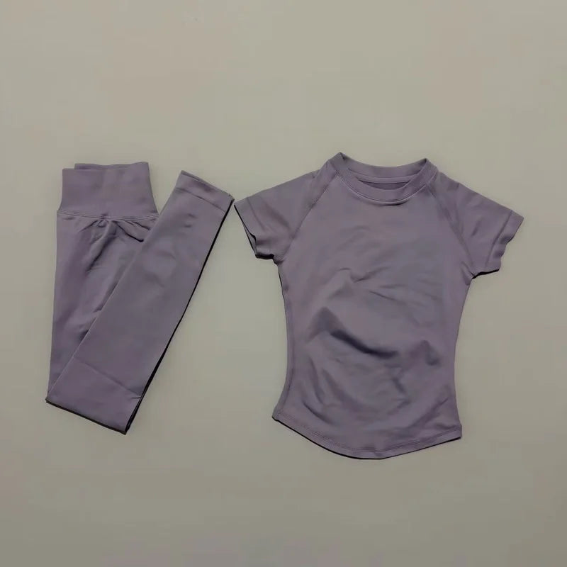 Conjunto deportivo de 2 piezas para mujer: camiseta de manga corta sin costuras y leggings deportivos con efecto realce de glúteos.
