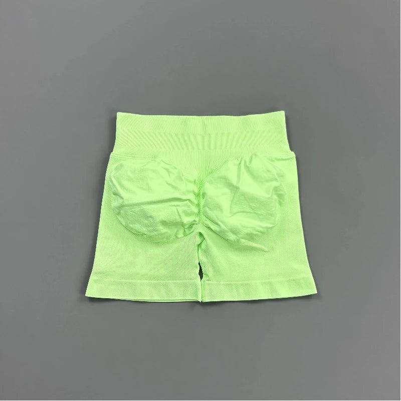 Pantalones cortos deportivos para mujer (tiro bajo, 4,5 pulgadas): ideales para fitness, ciclismo, running y yoga; diseño sin costuras y efecto "scrunch" para realzar los glúteos.