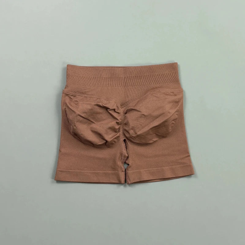 Pantalones cortos deportivos para mujer (tiro bajo, 4,5 pulgadas): ideales para fitness, ciclismo, running y yoga; diseño sin costuras y efecto "scrunch" para realzar los glúteos.