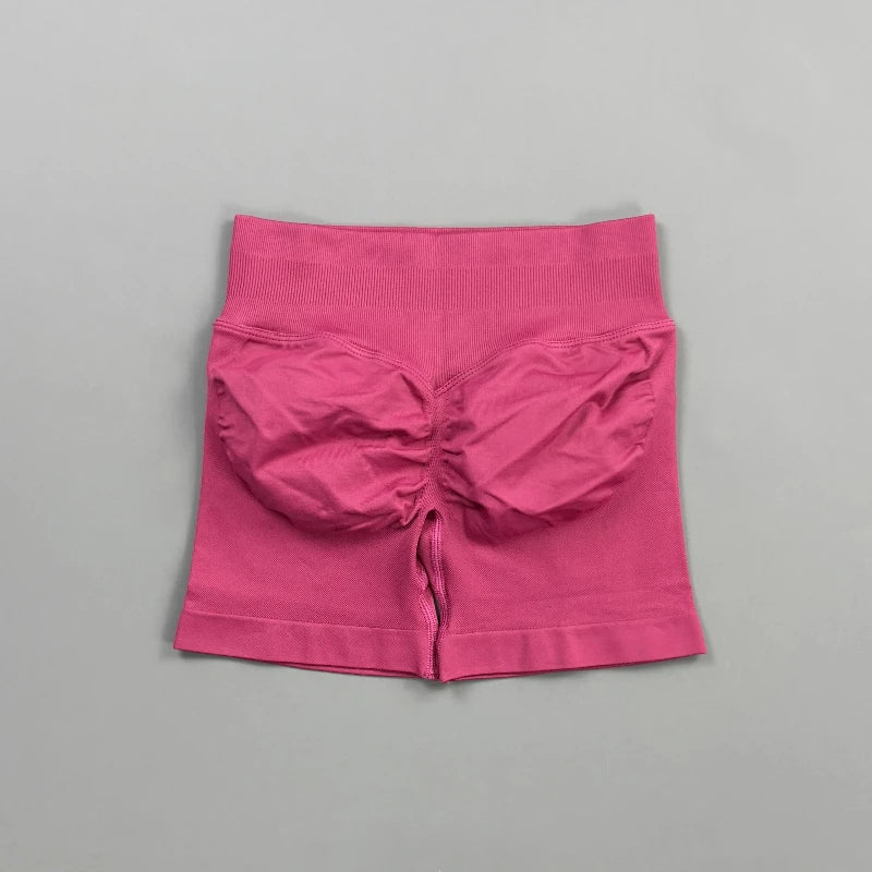 Pantalones cortos deportivos para mujer (tiro bajo, 4,5 pulgadas): ideales para fitness, ciclismo, running y yoga; diseño sin costuras y efecto "scrunch" para realzar los glúteos.