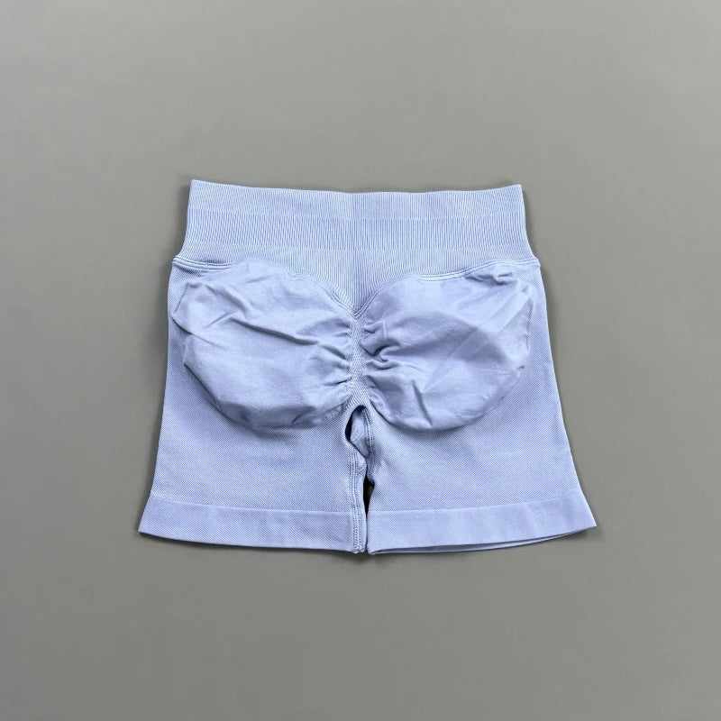 Pantalones cortos deportivos para mujer (tiro bajo, 4,5 pulgadas): ideales para fitness, ciclismo, running y yoga; diseño sin costuras y efecto "scrunch" para realzar los glúteos.