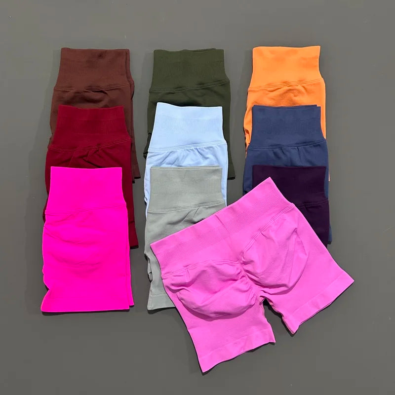 Pantalones cortos deportivos para mujer (tiro bajo, 4,5 pulgadas): ideales para fitness, ciclismo, running y yoga; diseño sin costuras y efecto "scrunch" para realzar los glúteos.