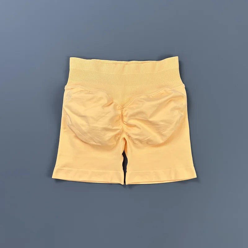 Pantalones cortos deportivos para mujer (tiro bajo, 4,5 pulgadas): ideales para fitness, ciclismo, running y yoga; diseño sin costuras y efecto "scrunch" para realzar los glúteos.
