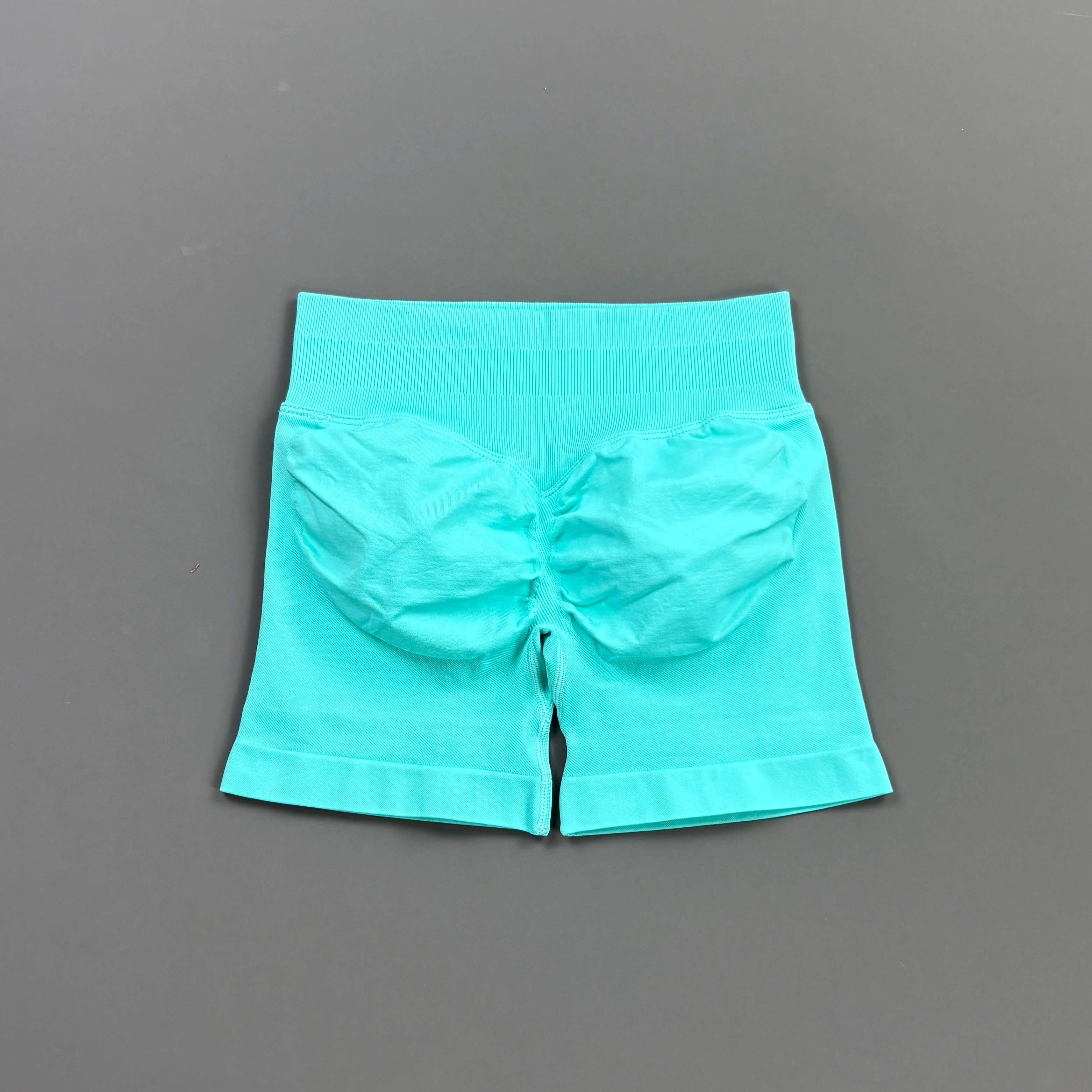 Pantalones cortos deportivos para mujer (tiro bajo, 4,5 pulgadas): ideales para fitness, ciclismo, running y yoga; diseño sin costuras y efecto "scrunch" para realzar los glúteos.