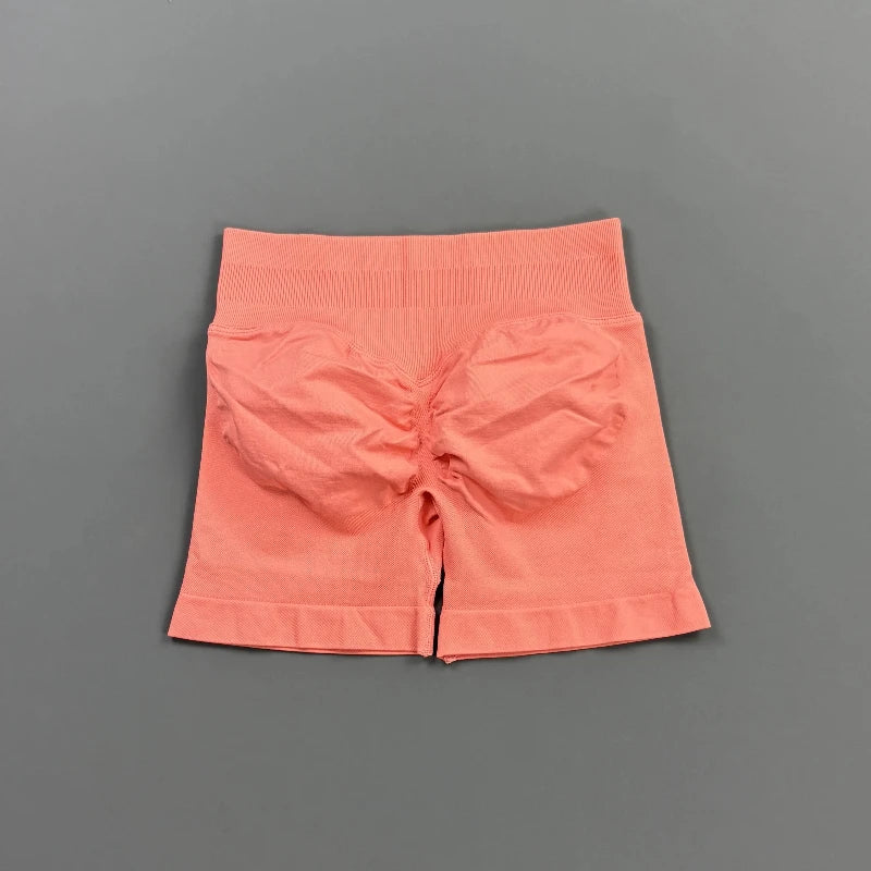 Pantalones cortos deportivos para mujer (tiro bajo, 4,5 pulgadas): ideales para fitness, ciclismo, running y yoga; diseño sin costuras y efecto "scrunch" para realzar los glúteos.