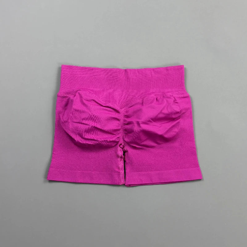 Pantalones cortos deportivos para mujer (tiro bajo, 4,5 pulgadas): ideales para fitness, ciclismo, running y yoga; diseño sin costuras y efecto "scrunch" para realzar los glúteos.