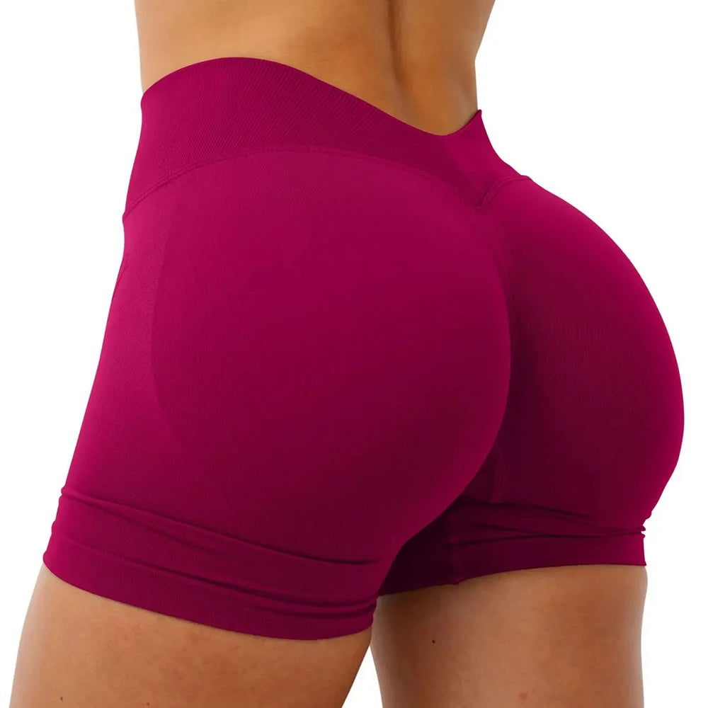 Shorts deportivos para mujer: sin costuras, ideales para yoga, fitness y entrenamiento; diseño con efecto realce de glúteos y cintura en forma de V.