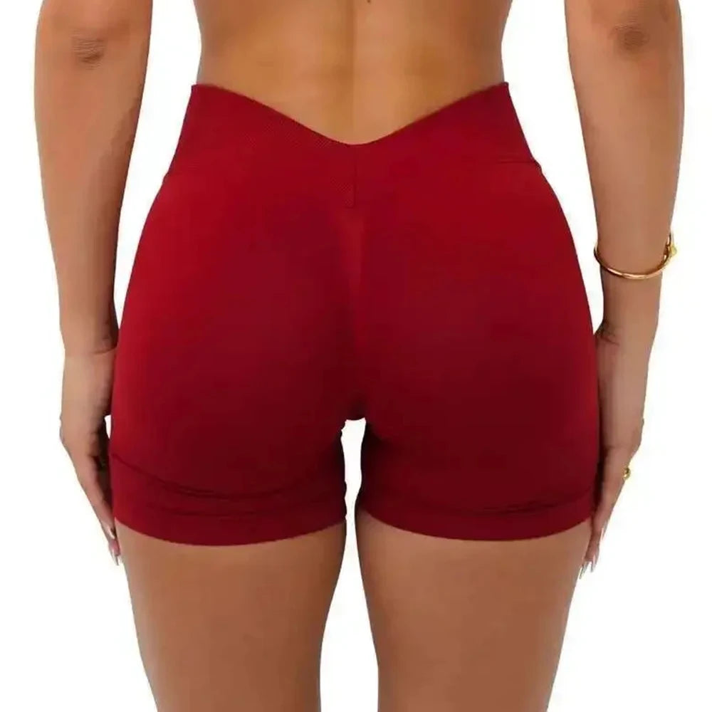 Shorts deportivos para mujer: sin costuras, ideales para yoga, fitness y entrenamiento; diseño con efecto realce de glúteos y cintura en forma de V.