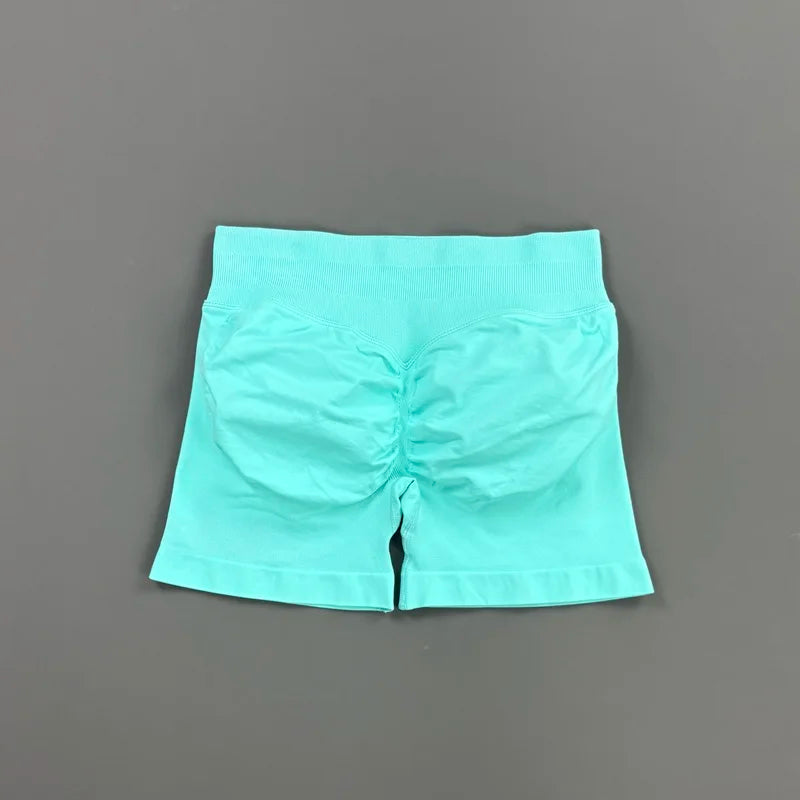 Pantalones cortos deportivos para mujer (tiro bajo, 4,5 pulgadas): ideales para fitness, ciclismo, running y yoga; diseño sin costuras y efecto "scrunch" para realzar los glúteos.