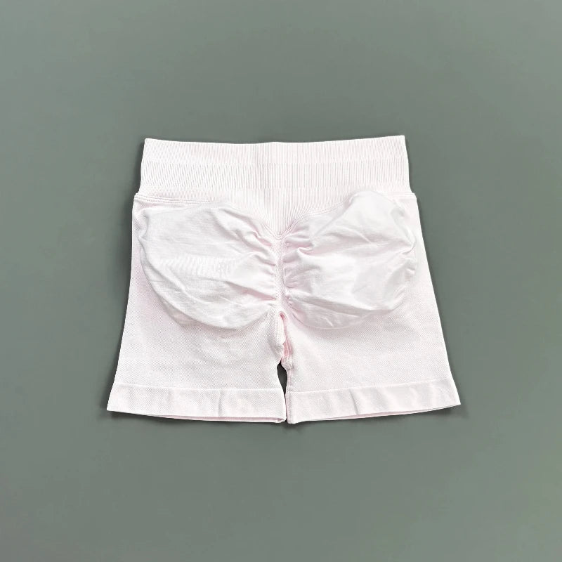 Pantalones cortos deportivos para mujer (tiro bajo, 4,5 pulgadas): ideales para fitness, ciclismo, running y yoga; diseño sin costuras y efecto "scrunch" para realzar los glúteos.