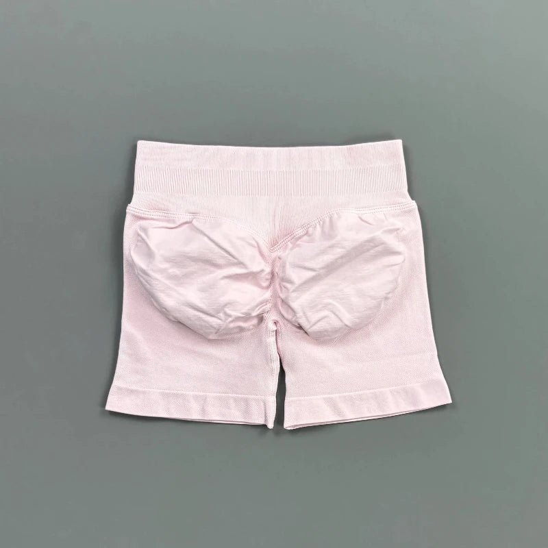 Pantalones cortos deportivos para mujer (tiro bajo, 4,5 pulgadas): ideales para fitness, ciclismo, running y yoga; diseño sin costuras y efecto "scrunch" para realzar los glúteos.