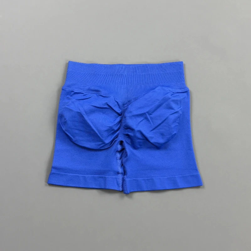 Pantalones cortos deportivos para mujer (tiro bajo, 4,5 pulgadas): ideales para fitness, ciclismo, running y yoga; diseño sin costuras y efecto "scrunch" para realzar los glúteos.