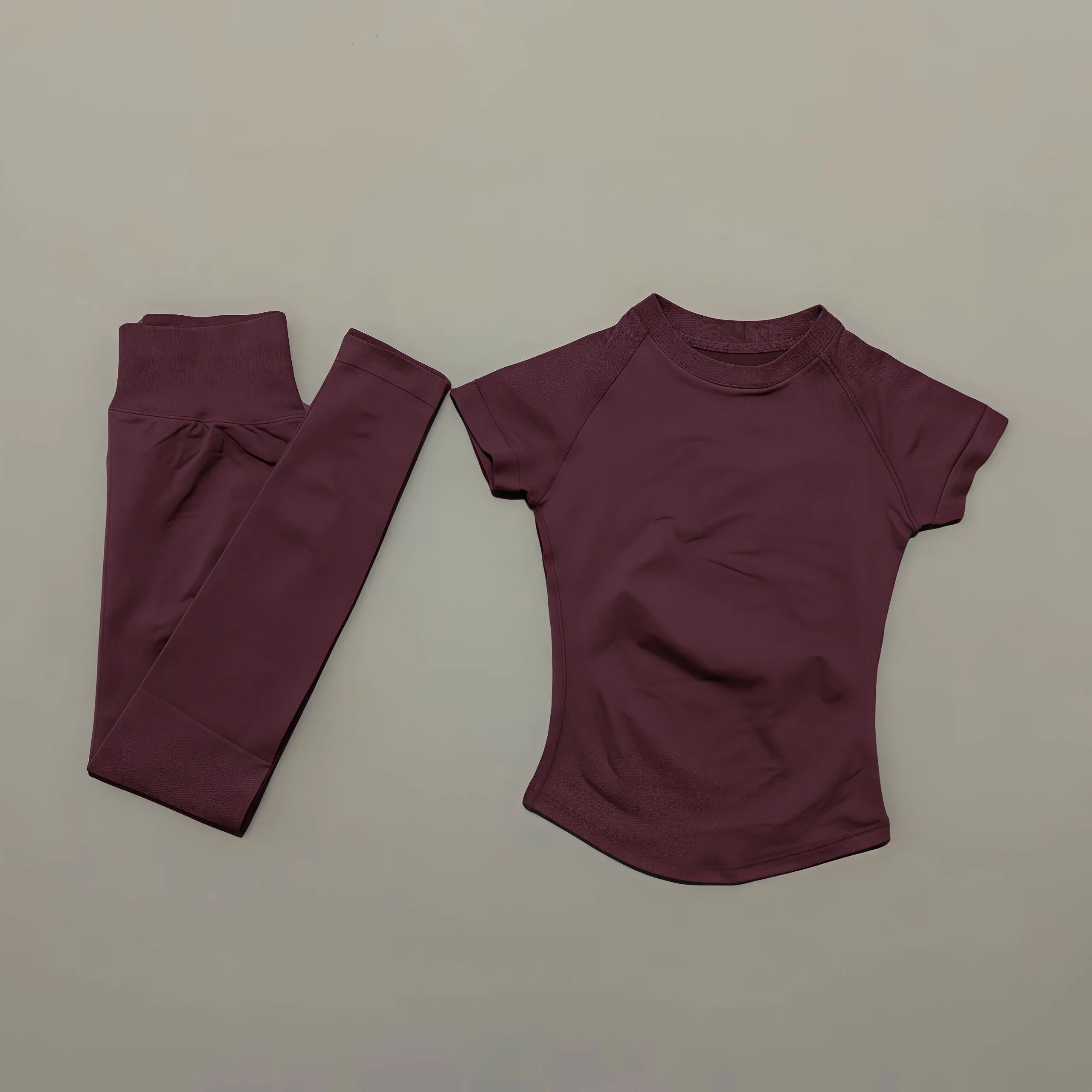 Conjunto deportivo de 2 piezas para mujer: camiseta de manga corta sin costuras y leggings deportivos con efecto realce de glúteos.
