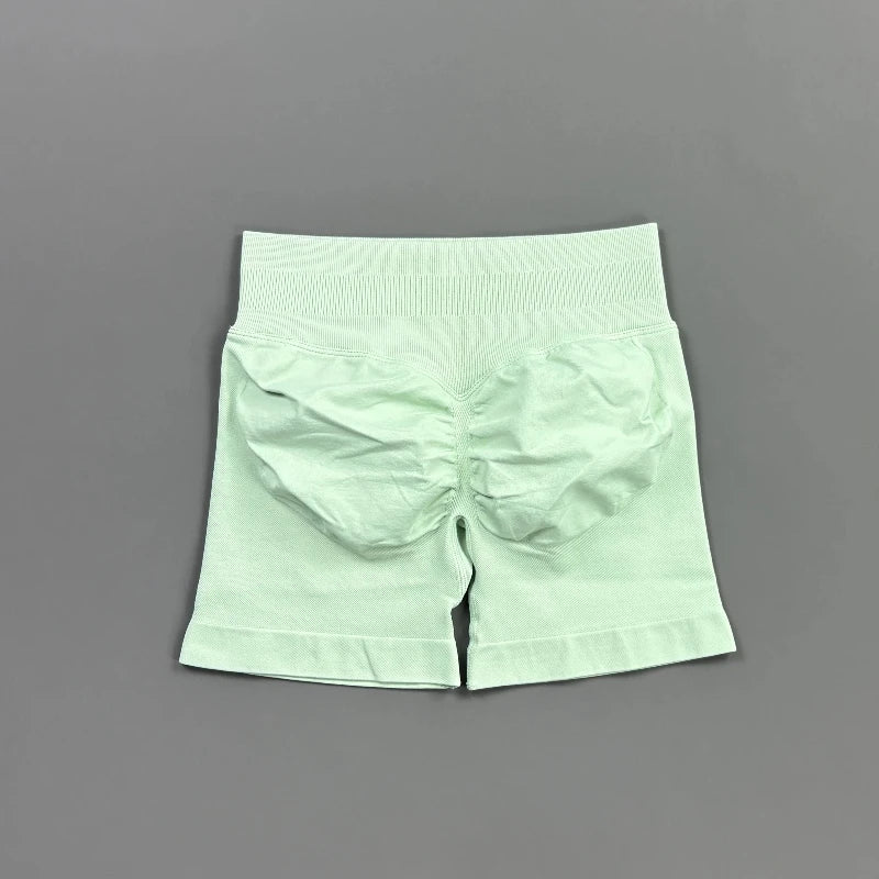 Pantalones cortos deportivos para mujer (tiro bajo, 4,5 pulgadas): ideales para fitness, ciclismo, running y yoga; diseño sin costuras y efecto "scrunch" para realzar los glúteos.
