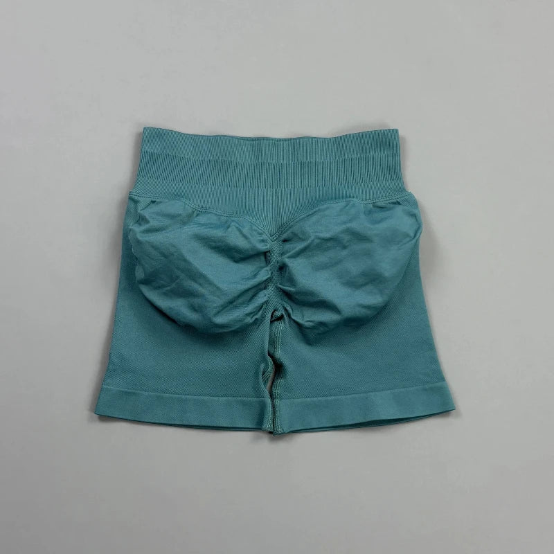 Pantalones cortos deportivos para mujer (tiro bajo, 4,5 pulgadas): ideales para fitness, ciclismo, running y yoga; diseño sin costuras y efecto "scrunch" para realzar los glúteos.