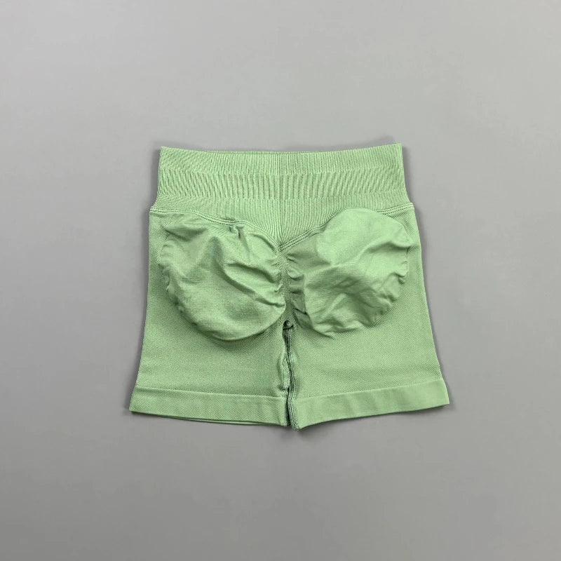 Pantalones cortos deportivos para mujer (tiro bajo, 4,5 pulgadas): ideales para fitness, ciclismo, running y yoga; diseño sin costuras y efecto "scrunch" para realzar los glúteos.