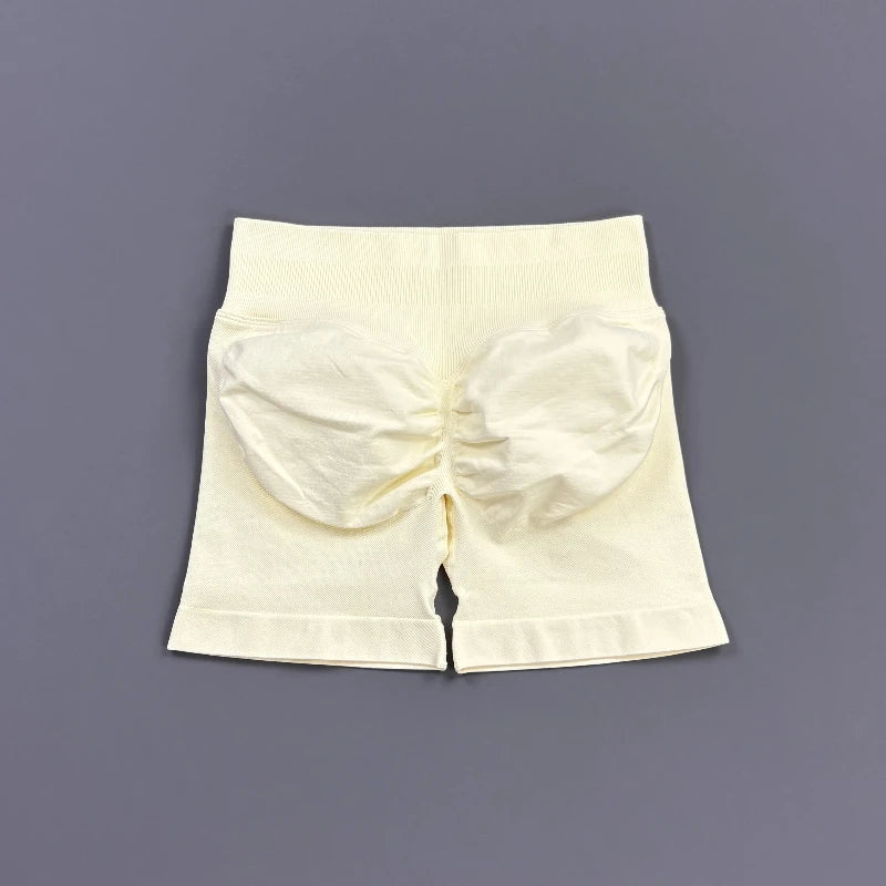 Pantalones cortos deportivos para mujer (tiro bajo, 4,5 pulgadas): ideales para fitness, ciclismo, running y yoga; diseño sin costuras y efecto "scrunch" para realzar los glúteos.