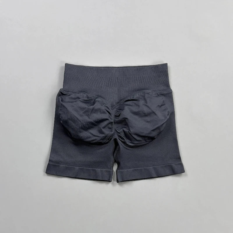 Pantalones cortos deportivos para mujer (tiro bajo, 4,5 pulgadas): ideales para fitness, ciclismo, running y yoga; diseño sin costuras y efecto "scrunch" para realzar los glúteos.