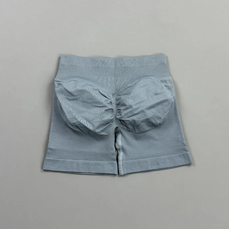 Pantalones cortos deportivos para mujer (tiro bajo, 4,5 pulgadas): ideales para fitness, ciclismo, running y yoga; diseño sin costuras y efecto "scrunch" para realzar los glúteos.