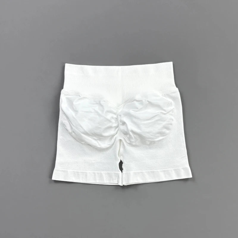 Pantalones cortos deportivos para mujer (tiro bajo, 4,5 pulgadas): ideales para fitness, ciclismo, running y yoga; diseño sin costuras y efecto "scrunch" para realzar los glúteos.