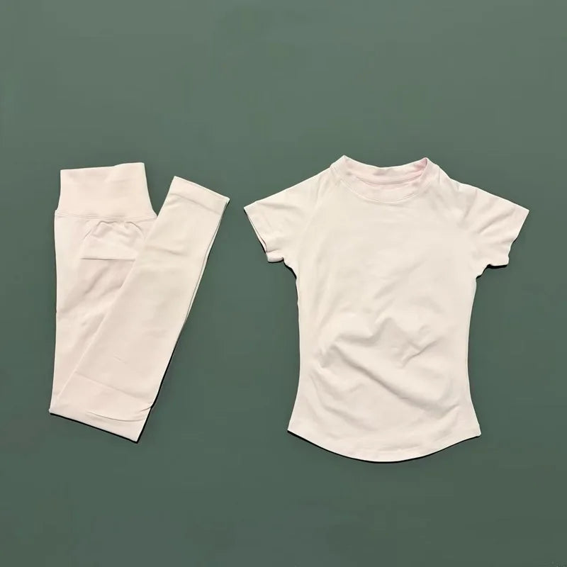 Conjunto deportivo de 2 piezas para mujer: camiseta de manga corta sin costuras y leggings deportivos con efecto realce de glúteos.