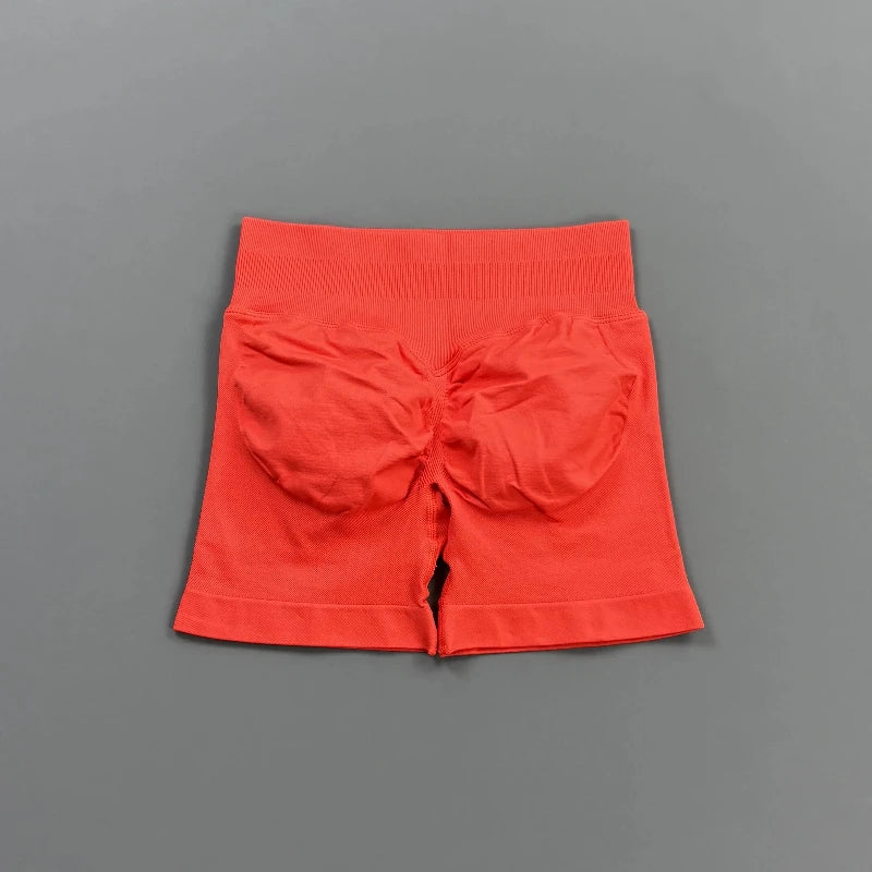 Pantalones cortos deportivos para mujer (tiro bajo, 4,5 pulgadas): ideales para fitness, ciclismo, running y yoga; diseño sin costuras y efecto "scrunch" para realzar los glúteos.