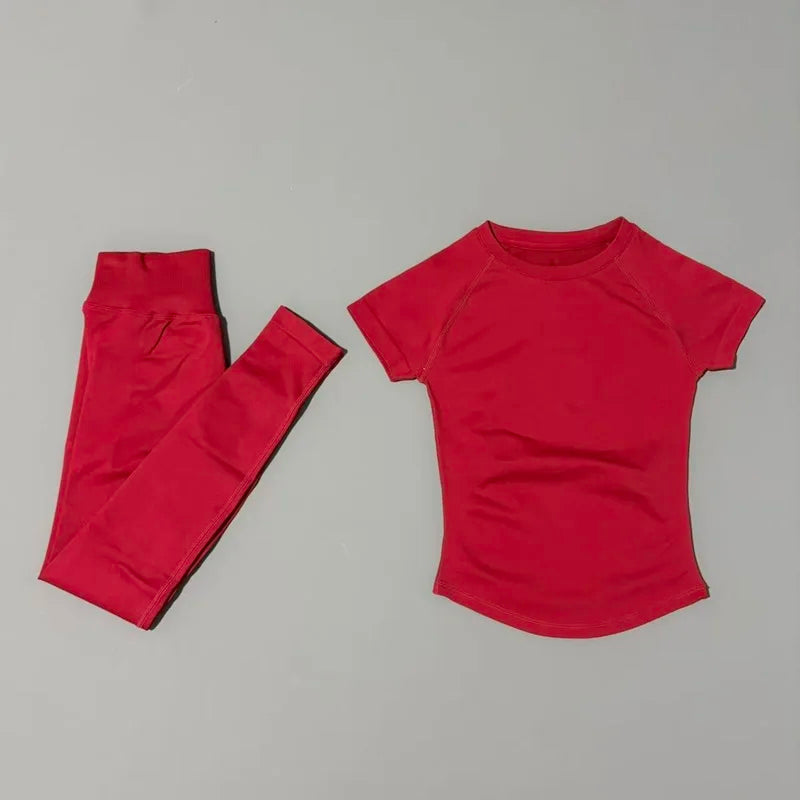 Conjunto deportivo de 2 piezas para mujer: camiseta de manga corta sin costuras y leggings deportivos con efecto realce de glúteos.