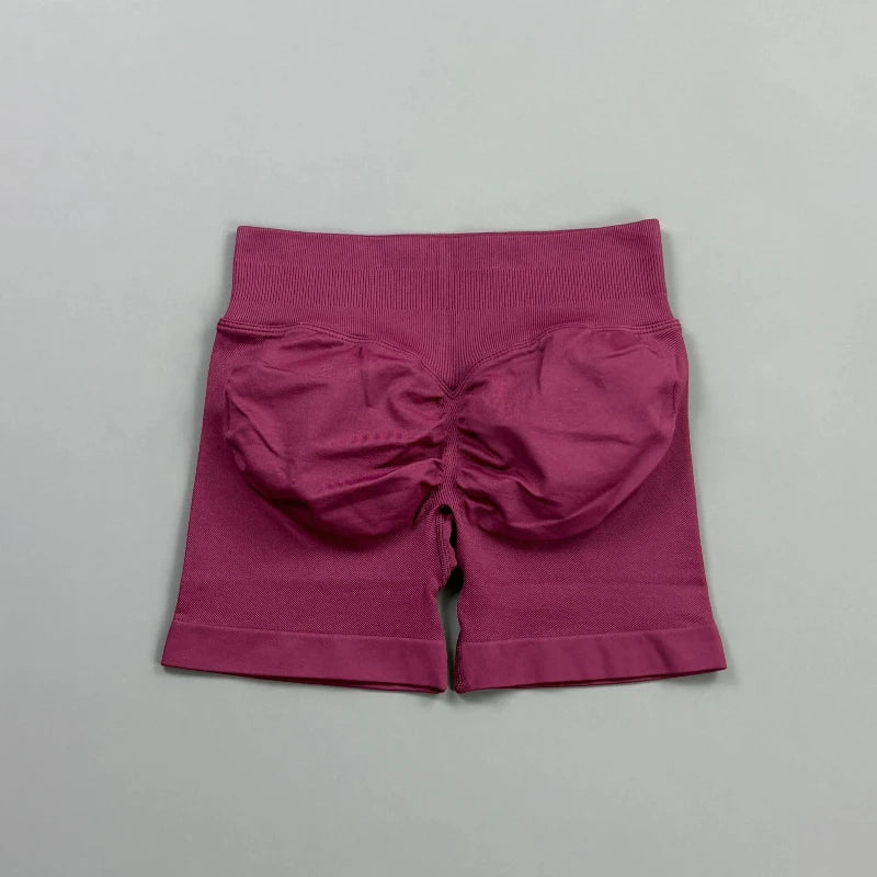 Pantalones cortos deportivos para mujer (tiro bajo, 4,5 pulgadas): ideales para fitness, ciclismo, running y yoga; diseño sin costuras y efecto "scrunch" para realzar los glúteos.