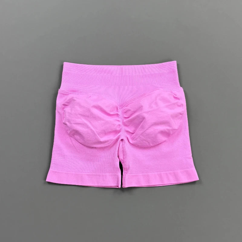 Pantalones cortos deportivos para mujer (tiro bajo, 4,5 pulgadas): ideales para fitness, ciclismo, running y yoga; diseño sin costuras y efecto "scrunch" para realzar los glúteos.