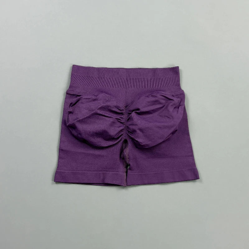 Pantalones cortos deportivos para mujer (tiro bajo, 4,5 pulgadas): ideales para fitness, ciclismo, running y yoga; diseño sin costuras y efecto "scrunch" para realzar los glúteos.