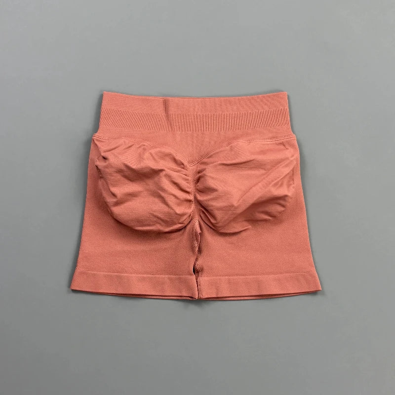 Pantalones cortos deportivos para mujer (tiro bajo, 4,5 pulgadas): ideales para fitness, ciclismo, running y yoga; diseño sin costuras y efecto "scrunch" para realzar los glúteos.
