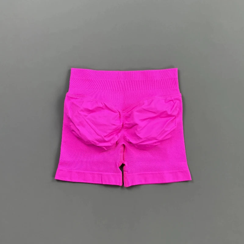 Pantalones cortos deportivos para mujer (tiro bajo, 4,5 pulgadas): ideales para fitness, ciclismo, running y yoga; diseño sin costuras y efecto "scrunch" para realzar los glúteos.