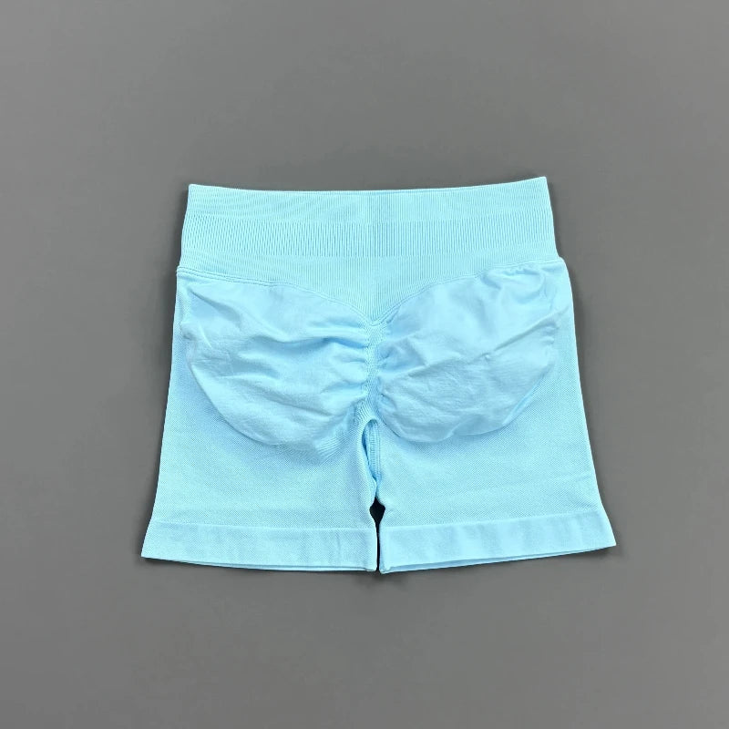 Pantalones cortos deportivos para mujer (tiro bajo, 4,5 pulgadas): ideales para fitness, ciclismo, running y yoga; diseño sin costuras y efecto "scrunch" para realzar los glúteos.