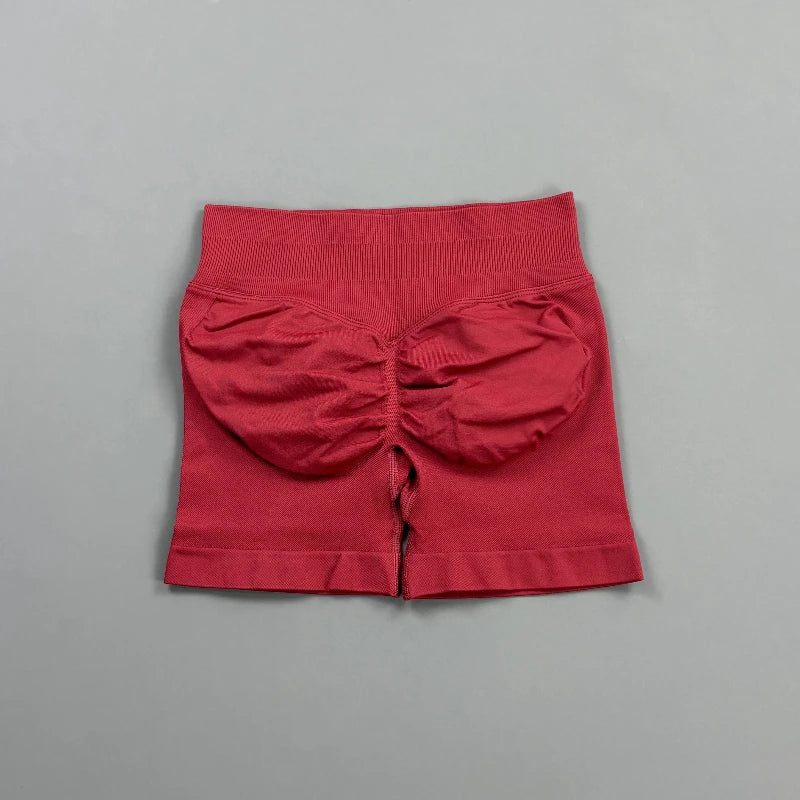 Pantalones cortos deportivos para mujer (tiro bajo, 4,5 pulgadas): ideales para fitness, ciclismo, running y yoga; diseño sin costuras y efecto "scrunch" para realzar los glúteos.