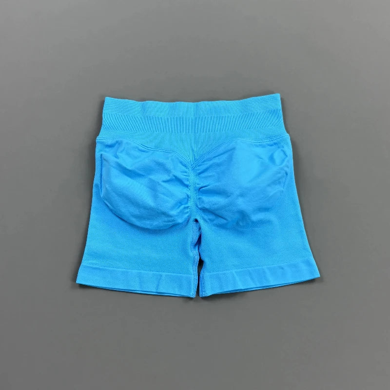 Pantalones cortos deportivos para mujer (tiro bajo, 4,5 pulgadas): ideales para fitness, ciclismo, running y yoga; diseño sin costuras y efecto "scrunch" para realzar los glúteos.