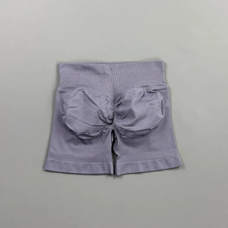 Pantalones cortos deportivos para mujer (tiro bajo, 4,5 pulgadas): ideales para fitness, ciclismo, running y yoga; diseño sin costuras y efecto "scrunch" para realzar los glúteos.